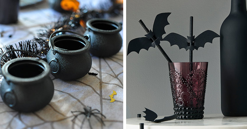Verwende in der Tischdeko elegante Halloween-Motive wie Hexenkessel und Fledermäuse