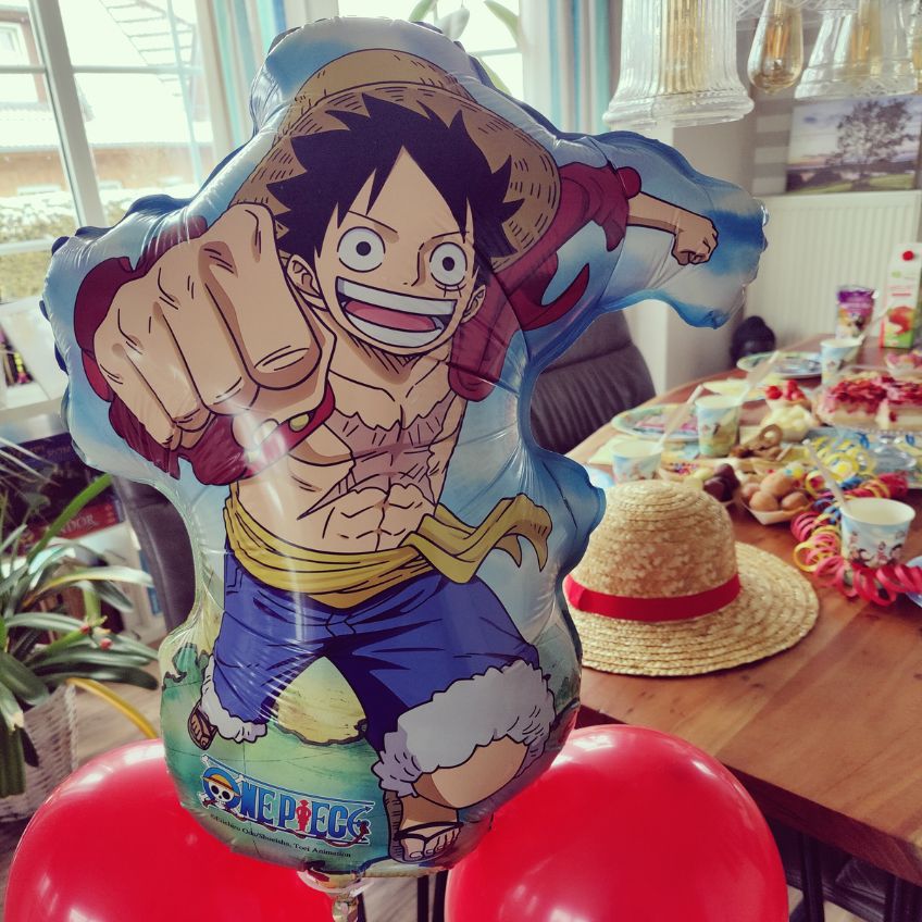 Anime Mottogeburtstag – Hauche deiner One Piece Party mit knalliger Ruffy-Deko Leben ein